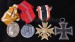 24 medaile k dekretům
